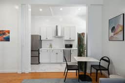 Spacious Apartment With Vibrant Style and Heated Pool - Image 5