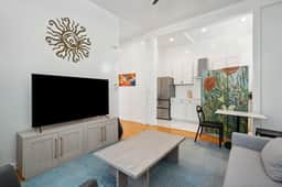 Spacious Apartment With Vibrant Style and Heated Pool - Image 4